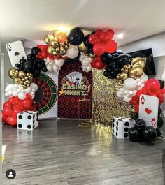 a casino themed party with balloons and dices