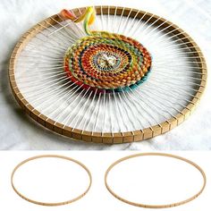 two circular objects made out of yarn and wood