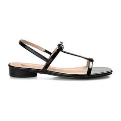 A sleek look for summer, the Zaidda by Journee Collection. This T-strap sandal features soft vegan leather and a padded insole for the perfect fit. A retro slingback strap and bow accent finish the design for an elevated finish.Closure Type: Pull OnShoe Heel Height: 1 InchUpper/Outer Base Material: 100% PolyuretheneShoe Lining Material: PolyurethaneSole Material Content: 100% PolyurethaneToe Type: Open ToeShoe Strap Type: Slingback StrapHeel Style: Block HeelCountry of Origin: Imported Sleek Open Toe Sandals With Buckle Closure, Flat Sandals With Buckle Closure For Evening, Sleek Slingback Sandals With Ankle Strap For Summer, Sleek Summer Slingback Sandals With Ankle Strap, Sleek T-strap Sandals For Evening, Chic Flat T-strap Sandals With Heel Strap, Elegant Flat Sandals With Adjustable Strap, Sleek Slingback Sandals With Heel Strap For Summer, Sleek Summer Slingback Sandals With Heel Strap