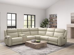 a living room with a sectional couch and coffee table