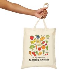 This 100% cotton bag comes in one size - 15" x 16"- perfect for everyday wear. While the canvas material will show off your designs in great colors, it's durable and will last for years. The bag features 20" handles (made from the same canvas), making it easy to carry even with a week's worth of shopping. .: 100% cotton canvas .: Heavy fabric (12 oz/yd² (406.9 g/m .: Sewn-in label .: Available in natural and black colors Eco-friendly Canvas Grocery Bag, Reusable Cotton Bags For Grocery Shopping, Reusable Cotton Grocery Shopping Bags, Organic Canvas Rectangular Bag, Organic Rectangular Canvas Bag, Reusable Tote Canvas Bag For Groceries, Reusable Grocery Tote Canvas Bag, Organic Cotton Canvas Bag For Everyday, Organic Cotton Canvas Tote Bag