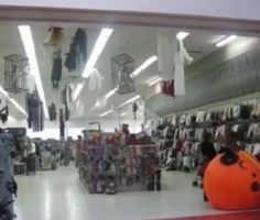 an orange ball sitting in the middle of a store