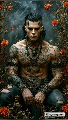 a man with tattoos sitting in front of flowers