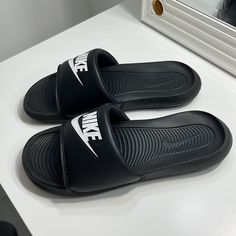 Women's Slides. Brand New! Comfortable Black Low-top Sandals, Nike Black Open Toe Slides, Nike Black Low-top Sandals, Comfortable Black Nike Sandals, Black Low-top Non-slip Sandals, Black Non-slip Low-top Sandals, Comfortable Black Flat Slides, Black Open Toe Sneakers For Summer, Nike Black Sneakers For Summer