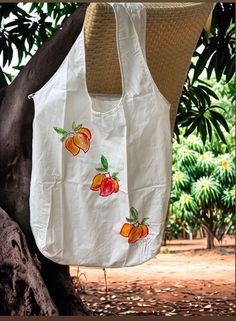 Best selling gift from Kaua'i Hawaii.  The farmers market tote shopping bags are super light weight cotton they fold up and fit in to the inside pocket which can also hold your money or credit card, I gave these out as gifts this year and they were such a huge hit I am adding these to my shop.  I am increasing the number of stamps on each bag as I repaint them.   Fabulous Kaua'i gift that won't break the bank.  Perfect bridesmaid gift - or holder for bridesmaids gifts for your Hawaii wedding. Summer Cotton Shoulder Bag For Travel, Casual Reusable Canvas Bag For Summer, Summer Cotton Shoulder Bag For Daily Use, Summer Cotton Beach Bag For Daily Use, Summer Cotton Beach Bag For Everyday Use, White Casual Cotton Beach Bag, Casual White Cotton Beach Bag, Summer Cotton Bags For Daily Use, White Cotton Summer Bag