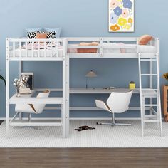 a white bunk bed with desk underneath it