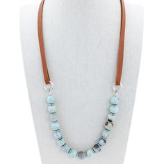 This beautiful handmade leather & ocean agate necklace makes a simple yet beautiful statement. Perfect for anyone who loves minimalist jewelry, you will love the juxtaposition of the caramel brown deerskin leather against the cool ocean agate stone beads. Boho, cottage chic, and even ideal for that upcoming rustic barn wedding.Necklace measures 24" and features a lobster claw clasp closure. Cork Jewelry, Eco Friendly Accessories, Lure Making, Deer Skin, Rustic Barn Wedding, Agate Necklace, Agate Stone, Leather Necklace, Cottage Chic