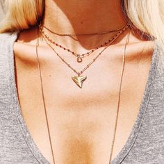 Solid bronze shark tooth, made from a tooth found on the beaches of Palm Beach on a gold filled satellite chain Gymnastics Necklace, Shark Teeth Jewelry, Tooth Jewelry, Silver Shark, Shark Necklace, Cute Ear Piercings, Shark Tooth Necklace, Tooth Necklace, Moissanite Necklace