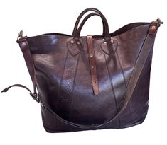 Measurements are 20" widest top and 15"5 bottom, 15" high, 7" deep and two 11' handles each side to side with a 44" shoulder straps each with a 19" drop. One large main compartment with a back zipper pocket,  unlined interior and front closure. Bag has solid brass hardware with vegetable tanned Italian leather. Tote is vintage in good condition for its age and there are some scuffs and marks along with minor rubbing on end of strap and two ink blotches at bottom and side.  This rugged duble RL s Brown Travel Bag For On-the-go, Brown Leather-lined Tote Duffle Bag, Brown Tote Duffle Bag With Leather Lining, Brown Leather-backed Tote Travel Bag, Brown Tote Travel Bag With Leather Backing, Brown Top Handle Weekender Bag For Shopping, Brown Duffle Bag With Handles For Everyday, Brown Leather-handled Duffle Bag Tote, Brown Leather Tote Weekender Bag