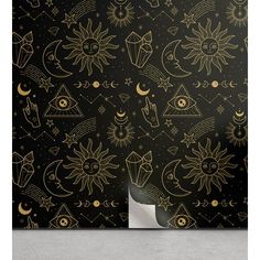 a black and gold wallpaper with an image of the sun, moon and stars