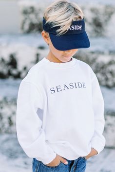 100% Preshrunk Cotton Garment Dyed Sweatshirt. Seaside logo screen printed on the front. Tagline, "New Town, Old Ways" graphic across the back. SIZING: XXS {size 18 mo to 2T} XS {size 3/4} S {size 5 to 6/8} M {size 8/10} L {size 10/12} Unisex Pre-shrunk Crew Neck Sweatshirt, White Soft-washed Crew Neck Sweatshirt, Seaside Sweatshirt, Seaside Style, Loose Pigments, Dyed Sweatshirt, Old Ways, Vinyl Shirts, New Town