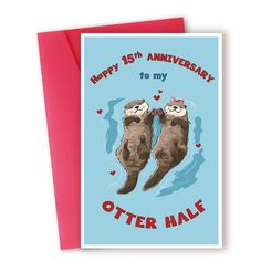 an anniversary card with two otters in the water