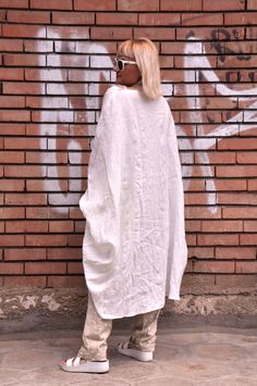 White Bohemian Linen Dress Made Of Ramie, White Bohemian Ramie Linen Dress, Oversized Bohemian Linen Dress For Spring, Oversized White Linen Casual Dress, Casual Oversized White Linen Dress, White Relaxed Fit Linen Tunic, Oversized Linen Dress For Spring, Oversized Long Sleeve Linen Dress For Vacation, Bohemian Oversized Tunic Linen Dress