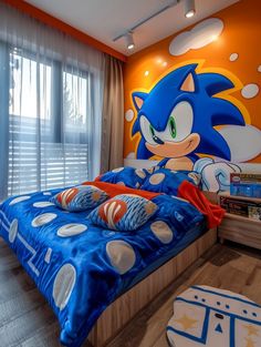 a bedroom decorated in blue and orange with sonic the hedgehog mural on the wall