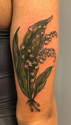 lily of the valley tattoo on leg