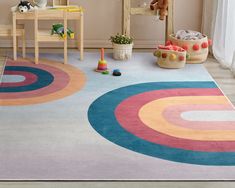 a child's play room with toys and rugs