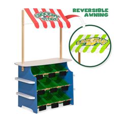 a toy stand with an umbrella and several bins