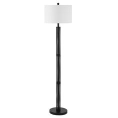 a black floor lamp with a white shade