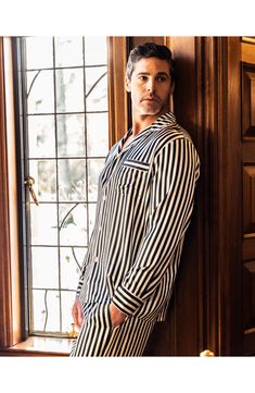 Crisp, yarn-dyed stripes balance the relaxed comfort of pajamas made of soft, cool silk that takes you easily from sweet slumber to lazy days and back. Top has notched collar; long sleeves 100% silk Dry clean Imported