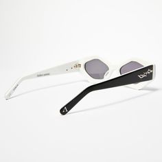 Keeping true to the signature ŁEOIDE grunge style, the RIOT is bold. These tough gender-neutral sunglasses are 100% handmade from the highest quality of Mazzucchelli Acetate and embellished with aggressive metal detail inlays on each arm. Each frame arm is joined by trustworthy 7-barrel Visottica hinges & core wire for maximum durability. These designer sunglasses are a directional staple in any fashion-forward individual's assortment. White Tinted Sunglasses For Streetwear, White Sunglasses With Mirrored Lenses For Streetwear, White Polarized Sunglasses For Streetwear, White Mirrored Sunglasses For Streetwear, Modern White Sunglasses For Streetwear, Black And White Sunglasses, Gender Neutral Style, White Frames, White Sunglasses