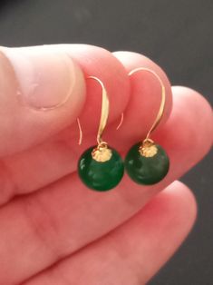 Beautiful Solid Gold Hook Earrings with Real Stone Beads of Green Jade in 18 Carats Yellow Gold, hallmarked. Very pretty, inspired by the Chinese  Traditional Style Jewellery, simple and pretty for everyday use. Great for children and adults, unisex. They are new and were never used, and will be sent in our jewellers box with certificate of authenticity.  Great for Gifts, very cute and bright.  Only One pair available!  Don't miss this exclusive and unique design from our limited edition collect Elegant Nickel-free Heart Earrings, Elegant Nickel-free Round Heart Earrings, Nickel-free Heart Earrings For Anniversary, Dainty Round Earrings For May Birthstone, Round French Hook Earrings For Anniversary, Gold Emerald Earrings, Jewellery Simple, Gold Heart Earring, Heart Earring