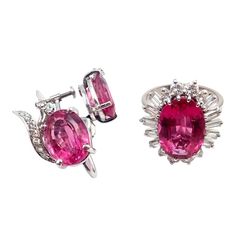 This H. Stern jewelry set, elegantly crafted from 18k white gold, exudes luxury and sophistication. The centerpiece of the set is the ring, featuring a stunning pink tourmaline, known for its captivating hue. This gemstone is beautifully accented with an array of brilliant diamonds that encircle it, enhancing its radiance. Complementing the ring are a pair of earrings, designed in harmony with the ring. These earrings also showcase pink tourmalines, each surrounded by sparkling diamonds, creatin Elegant Pink Jewelry With Polished Finish, Luxury Pink Sapphire Earrings For Formal Occasions, Elegant Oval Tourmaline Earrings, Elegant Pink Sapphire Earrings For Formal Events, Elegant Pink Sapphire Earrings For Formal Occasions, Formal Pink 14k White Gold Jewelry, Elegant Hallmarked Pink Sapphire Jewelry, Tourmaline White Gold Jewelry With Prong Setting, White Gold Tourmaline Jewelry With Prong Setting