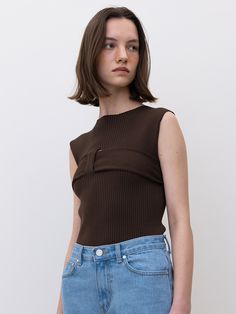 Editor's noteSensual knittop that made of solid ribbed fabric. Featuring its unique design with the asymmetricalhole detail of the chest and the short length. You can style with various kindsof bottoms like slacks, denim jeans, or skirts to complete the look in summer. - Standardsilhouette- Ribbedpattern- Hole detail atthe front- Both sensualand unique mood Measurements(in.)SIZE (34/36)- Shoulder: 12.79in / 13.58 in- Chest: 12.2in / 13.38 in- Hem: 12.2 in/ 13.38 in- Armhole: 6.69in / 7 Chic Brown Ribbed Knit Top, Chic Brown Sleeveless Knit Top, Chic Sleeveless Brown Knit Top, Chic Brown Knit Tank Top, Sleeveless Knit Top, Sleeveless Knit, Other Outfits, Ribbed Fabric, Fabric Covered