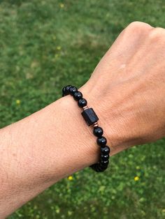 One of my best selling bracelets now available in 6mm stones. All the benefits of black tourmaline with a constant reminder of the absolute beauty in raw, unpolished and “imperfect”. (Insert favourite metaphor here: for humanity, life, love, authenticity, etc😊)This simple yet powerful 6mm AAA Black Tourmaline bracelet features a rugged raw black tourmaline nugget focal stone! One of the best healing stones for protection and overall wellbeing!!Materials:6mm AAA Grade Black Tourmaline 7-8mm Genu Black Hypoallergenic Spiritual Jewelry, Black Bracelets With Natural Stones For Everyday, Hypoallergenic Black Bracelet As Gift, Minimalist Black Bracelet For Meditation, Minimalist Black Bracelets For Meditation, Minimalist Black Healing Bracelet, Everyday Hypoallergenic Black Beaded Bracelets, Black Hypoallergenic Everyday Bracelets, Everyday Black Hypoallergenic Bracelets