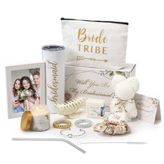 a bride's gift box with a teddy bear, candle and other items