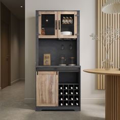 a cabinet with wine bottles in it next to a dining room table and wall decor