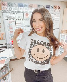 This is a must have teacher tee! This fun tee is lightweight, extremely soft, and comfortable! Style this graphic tee with a skirt, shorts, or jeans to get the perfect retro look! Features High Quality Design Premium Tees Short Sleeves Crew Neck Unisex Sizing Pre-Shrunk Printed & Shipped from the USA Unisex Sizing All of our tees are unisex. We recommend to keep your regular size for a comfy look or size down for a fitted look. If you do have any sizing questions, please see our unisex sizing ch Fun Slogan T-shirt For Everyday, Trendy Relaxed Fit Tops For School, Trendy School T-shirt With Slogan, Trendy Funny Print T-shirt For School, Trendy School T-shirt With Funny Print, Spring Graphic Print T-shirt For School, Summer School Spirit T-shirt With Graphic Print, Casual Short Sleeve T-shirt For School, Fun Relaxed Fit T-shirt For School