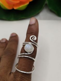 About item Item :- Moonstone Gemstone arthritis ring Ring size :- Chose from variation (Custom size accepted) Material  :- 925 Sterling silver Purity  :- 92.5 Title:- Thumb Splint MCP 925 Silver Ring, MCP Hyper extension Splint Ring, Arthritis Rings, Trigger splint Ring, EDS Splint, Moonstone Splint Rings Description:- We use 925 sterling silver to making jewelry. We accept all types of custom & personalized order. Please send us a message if you are interested in a custom creation. Shipping profile:- We ship all order within 3-5 days. But custom order takes time. Customer service :- If you have any question about our products & services, feel free to contact us. We do always best for our customers Other Specification:- Please Visit Our Shop home page to view our complete collection. If yo Adjustable Spiritual Moonstone Toe Ring, Adjustable Silver Moonstone Toe Ring, Unique Adjustable Moonstone Open Ring, Unique Adjustable Open Moonstone Ring, Adjustable Unique Open Moonstone Ring, Adjustable Moon Shape Unique Ring, Silver Moonstone Stackable Open Rings, Unique Adjustable Moon Shaped Ring, Unique Adjustable Moonstone Ring