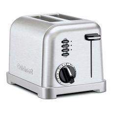 a silver toaster sitting on top of a white table