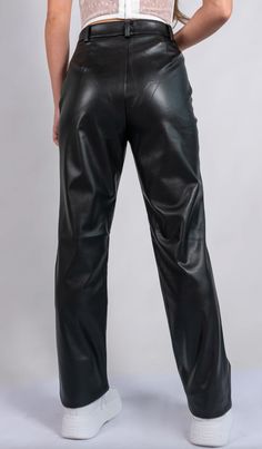 The Mercer Faux Leather Pant will be your fave new go-to for an edgy touch to any look. Black and timeless, its a must-need in your wardrobe! Features: Side slant pockets Clasp and zip-closure Faux-leather Edgy Straight Leg Leather Pants With Belt Loops, Sleek Leather Bottoms With Zipper Closure, Sleek Leather Pants With Zipper For Work, Sleek Faux Leather Bottoms With Belt Loops, Edgy Faux Leather Straight Leg Bottoms, Faux Leather Pants With Faux Front Pockets For Work, Faux Leather Pants For Workwear With Faux Pockets, Sleek Faux Leather Pants With Belt Loops, Winter Workwear Bottoms With Zip Fly