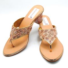 Rose Gold beaded embroidered design strap sandals offer a comfortable sole to walk on. They are beaded with Silver, light gold Rhinestones and Rosegold beads. These shoes are absolutely comfortable and offer a simple yet elegant design. These are perfect for a night out or a simple day. See our page for more of our collection of shoes we offer. We ship out in a timely matter, wrapped in care for a safe secure trip to your location. Thank you for supporting our small business. Shipped from the USA. Sizes available US 6,7,8,9,10,11. Party Open Toe Heels With Zari Work, Party Heels With Zari Work And Open Toe, Gold Open Toe Heels For Festivals, Festive Gold Heels With Zari Work, Festive Summer Heels High Heel, Gold Heels With Zari Work For Festivals, Gold Heels With Zari Work For Festive Occasions, Elegant Gold Heels With Zari Work, Festive Summer High Heels