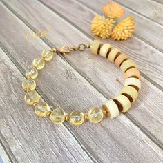 For this unique citrine bracelet I've chosen 8mm faceted coin-shaped citrine gemstones & 10mm heishi-shaped sunstone gemstones. The bracelet is accented with brass components and is finished with a lobster clasp. Processing time is only 1 business day & will be gift wrapped! M O R E 🌴 GO O D I E S 🌴 H E R E https://www.etsy.com/shop/CstaJewelry  Guarantee: It is my goal to provide you with beautiful pieces of jewelry that will last a lifetime. I guarantee all my work. If for any reason you are Sunstone Bracelet, Lawrence Ks, Citrine Bracelet, Citrine Beads, Yellow Gemstones, Crystal Healing Bracelets, Jade Earrings, Rustic Jewelry, Yoga Jewelry