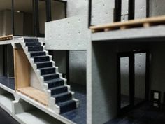 a model of a building with stairs and windows