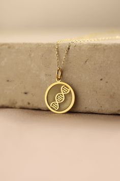 Gold DNA Pendant - DNA Gold Necklace ● Material of pendant: Solid Gold 14k ( REAL GOLD ) ● Metal Stamp: 14k ( REAL GOLD ) ● The pendant is available in 5 sizes: - 12,7 mm / 0.5 inches (Diameter) - 14,0 mm / 0,55 inches ( Diameter ) In the photos - 15,3 mm / 0.6 inches ( Diameter ) - 16,5 mm / 0,65 inches ( Diameter ) - 19,1 mm / 0,75 inches ( Diameter ) ( In the photos the size is 14mm / 0.55 inches Diameter ) ( Jump Ring inner diameter: 4 mm ) ● Material of chain: Solid gold 14k ( REAL GOLD ) I Dna Necklace, Dna Jewelry, Doctor Gift, Double Helix, Women Nurse, Science Gifts, Beaded Jewels, Nurse Doctor, Doctor Gifts