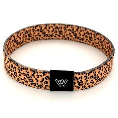 "Accessorize with our popular Leopard print band. Available sizes:  Extra Small 5.5\" (petites + kids) Small 6.5\" (most common fitting size) Medium 7.5\" (large wrists) Large or Anklet 8.5\" (very large wrists or anklet) 3/8\" Width Reversible surf, music and beachy prints. Elastic blend material, can stretch to desired fit. Packaged in natural drawstring gift pouches. Machine washable. Chlorine and saltwater safe." Casual Black Band Wristband Bracelet, Casual Black Wristband Bracelet, Adjustable Band Bracelet, Casual Band Bracelets For Friendship, Adjustable Black Casual Wristlet, Casual Black Adjustable Wristlet, Adjustable Casual Wristband, Adjustable Band Bracelet Casual Style, Trendy Adjustable Wristband