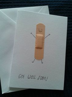 two greeting cards, one with a bandage on it and the other says get well soon