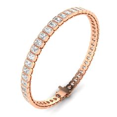 The bezel set shaped diamond tennis bracelet is handcrafted in 14K or 18K yellow, rose, or white gold, and round, brilliant-cut white diamonds. A beautiful bracelet with timeless appeal that can be worn anywhere. It makes the perfect gift for yourself or someone you love, because diamonds are always forever. 14K & 18K gold 7.70 cts radiant cut diamonds 48 diamonds D-E-F color white diamonds 11.78 grams gold Diamond clarity is VVS-VS Secure insert clasp with safety link for safety, diamonds conti Luxury Rose Gold Channel Set Jewelry, Luxury Rose Gold Jewelry With Channel Set, Rose Gold Diamond Bracelet With Bezel Setting, Rose Gold Tennis Bracelet With Single Cut Diamonds, Rose Gold Diamond Bracelet With Bezel Setting For Anniversary, Rose Gold Bezel Set Bracelets For Wedding, Rose Gold Wedding Bracelet With Bezel Setting, Bezel Set Earrings, Signature Bracelet