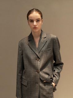 Editor's NotesAVA MOLLI's check jacket  encapsulates the brand's affinity to feminine drapes - Premium glen check wool jacket- Crated from premium wool blend fabric certified by 'Wool Mark' - Three-button closure- Classic moodMeasurement (inch)S / M- Length: 29.1in / 29.5in- Shoulder: 17in / 17.7in- Chest: 40.3In / 42.1in- Hem: 41in / 42.7in- Armhole: 9in / 9.3in- Sleeve width: 7.3in / 7.7in- Sleeve length: 23.6in / 23.6in- Cuff: 5.5in / 5.7in* Model info: Height 5'6 Bust 30' Waist 22' HIps 34', wearing size M (ourter) S (pants)                                        Composition & Care- 98% Wool 2% Polyurethane- Dry cleaning onlyDesigner- Made in Korea- Red Checked Shirt, Check Jacket, Checked Jacket, Black Leather Pants, Button Jacket, Wide Pants, Check Shirt, Mens Outerwear, Jacket Buttons