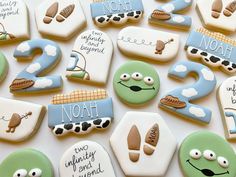 decorated cookies are arranged in the shape of letters and numbers for noah's ark