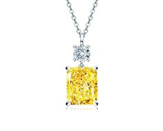 PRICES MAY VARY. Radiant Dangling Pendant Necklace: The yellow and white synthetic diamond is cut and polished into brilliance rectangle and round shape to maximise their scintillation. It is suspended from a white gold chain. With their streamlined silhouette complemented by a delicate chain that allows the stone to take centre stage. It is classic and elegant, perfect for both daywear and eveningwear. Specification: The pendant necklace is made of 1pc 6ct radiant cut rectangle shape yellow syn Yellow Polished Necklace For Anniversary, Anniversary Yellow Polished Necklace, Yellow Brilliant Cut Jewelry As A Gift, Yellow Brilliant Cut Jewelry Gift, Silver Necklace For Women, Pear Shaped Pendant, Synthetic Diamond, White Gold Chain, White Gold Chains