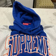 Supreme Hoodie (Blue/White/Orange). Men’s Medium Never Worn. Supreme Hoodie, Mens Shirts, Blue And White, Man Shop, Sweatshirts Hoodie, Orange, White, Blue