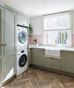 a washer and dryer in a small kitchen