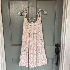 This Cute Dainty Floral Sundress From Altar’d State Is Perfect For Spring Or Easter! It Is New With Tags And Absolutely Adorable. The Back Has A Fun Cross Strap Pattern With Fun Stitching At The Base. Let Me Know If You Have Any Questions! Pink Ditsy Floral Print Sundress For Summer, Pink Printed Sundress Mini Dress, Pink Ditsy Floral Print Sundress For Brunch, Pink Ditsy Floral Print Sundress For Spring, Pink Ditsy Floral Print Sundress For Day Out, Pink Fitted Printed Sundress, Pink Ditsy Floral Print Dress For Beach, Pink Printed Fitted Sundress, Pink Ditsy Floral Print Summer Dress