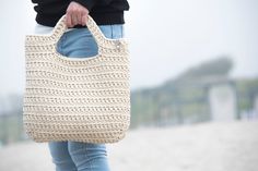 Stylish, roomy, soft and cosy crochet tote bag for those who love comfortable things! 𝙎𝙄𝙕𝙀 Approx. Dimensions of the finished tote bag: H e i g ht: ± 35 cm (13.8 inches) and ± 40 cm (15.7 inches) with handles. W i d t h : ± 37 cm (14.6 inches) 𝙒𝙀𝙄𝙂𝙃𝙏 Approx. 0.650-700 gr/1.43-1.54 lb 𝘾𝙊𝙇𝙊𝙍 𝙊𝙉 𝙋𝙃𝙊𝙏𝙊 6. Cream ✘Rope with UV protection! In to continual outdoor sunlight exposure does not changes the color. ✘Please note that colors may vary due to your computer's settings, monito Sac Granny Square, Cosy Crochet, Cream Bag, Crochet Beach Bags, Handbag Design, Cream Bags, Granny Square Bag, Rope Bag, Crochet Tote Bag