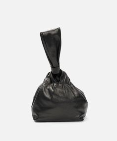 This beautiful Mariposa Bucket Bag captivates with its stunning metallic black hue and soft Italian lambskin leather. Enjoy the chic ruched look that gathers to cleverly close, plus a soft leather handle to carry on your wrist. Whether a special occasion or a spur of the moment adventure, its unique style will ensure you look and feel great! 6" x 6"w, 7" h Made in Los Angeles, CA Soft Leather Party Pouch Bag, Soft Leather Pouch Bag For Party, Leather Top Handle Clutch For Party, Party Evening Bag With Handle Drop In Leather, Black Soft Leather Clutch For Evening, Party Shoulder Bag With Top Handle In Soft Leather, Party Soft Leather Top Handle Shoulder Bag, Soft Leather Top Handle Shoulder Bag For Party, Party Top Handle Bag In Textured Leather