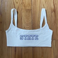 Handmade state cropped tiny tank. Perfect for tailgates or showing spirit! Summer Casual Cheerleading Crop Top, Summer Casual Crop Top For Cheerleading, Casual Summer Game Day Crop Top, Casual Summer Crop Top For Cheerleading, Casual Summer Crop Top For Game Day, Sporty Crop Top For College In Spring, Collegiate Summer Tops For Cheerleading, Summer Cheerleading Tops With School Spirit Style, School Spirit Tops For Summer Cheerleading